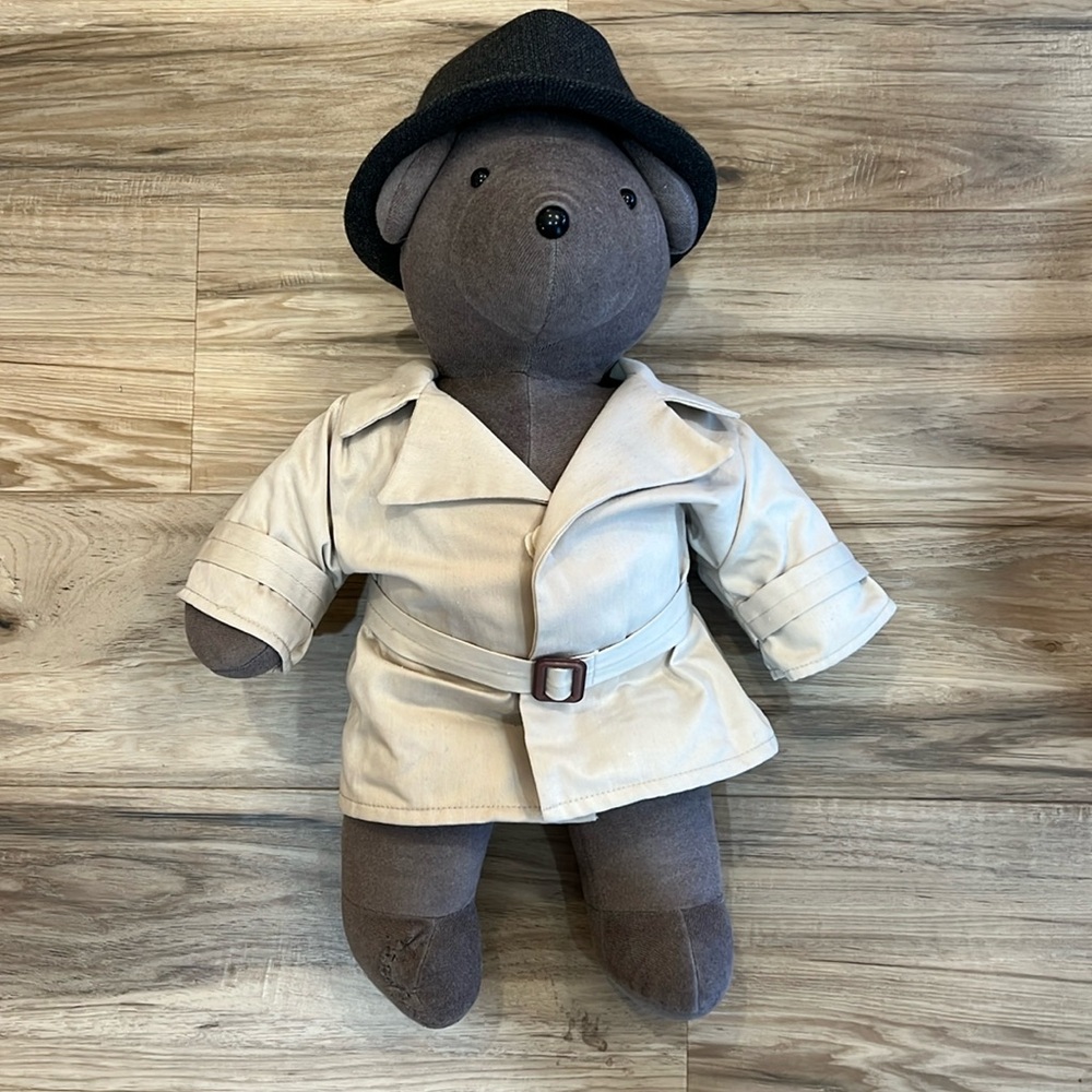 Bear with trench coat and fedora.